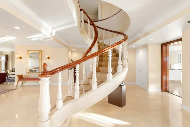 Sweeping views and a sculptural staircase stand out in this $8M Sutton Place duplex