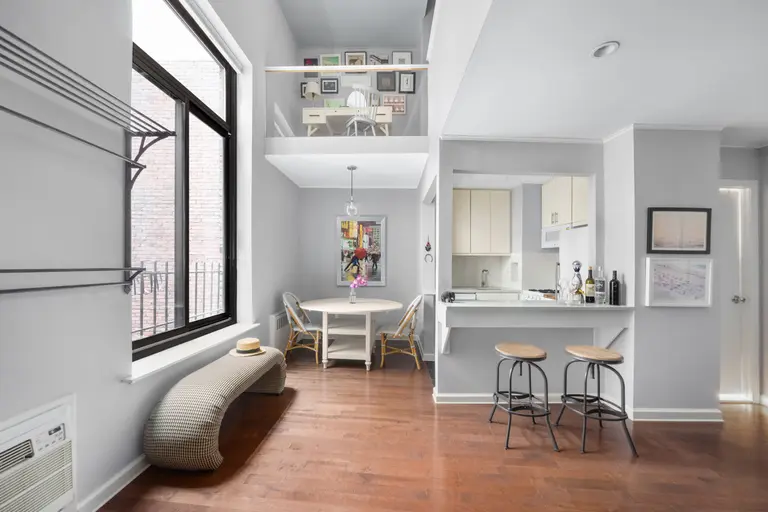Live across the street from The Strand in this $695K loft duplex