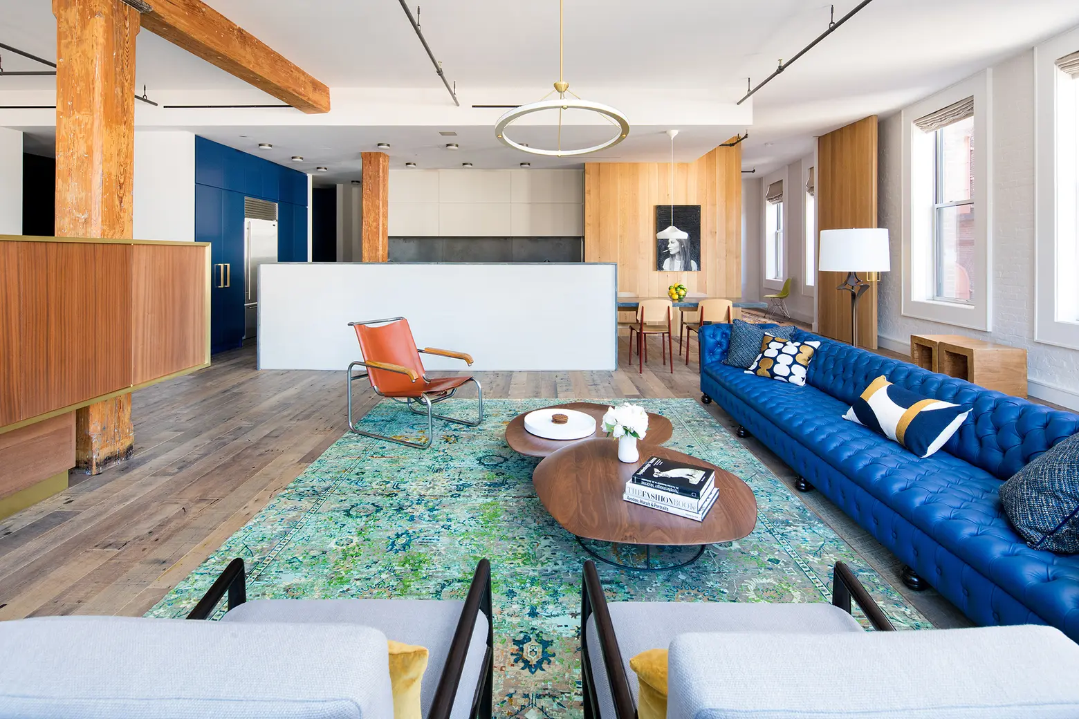 $20K/month Nolita loft is colorful, modern, and above a library