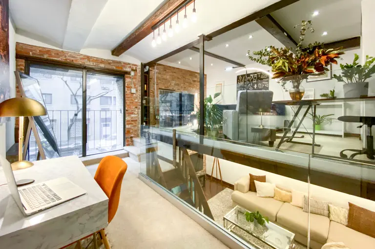 Cast iron accents and a glassed-in loft bring the drama to this $750K Gramercy co-op