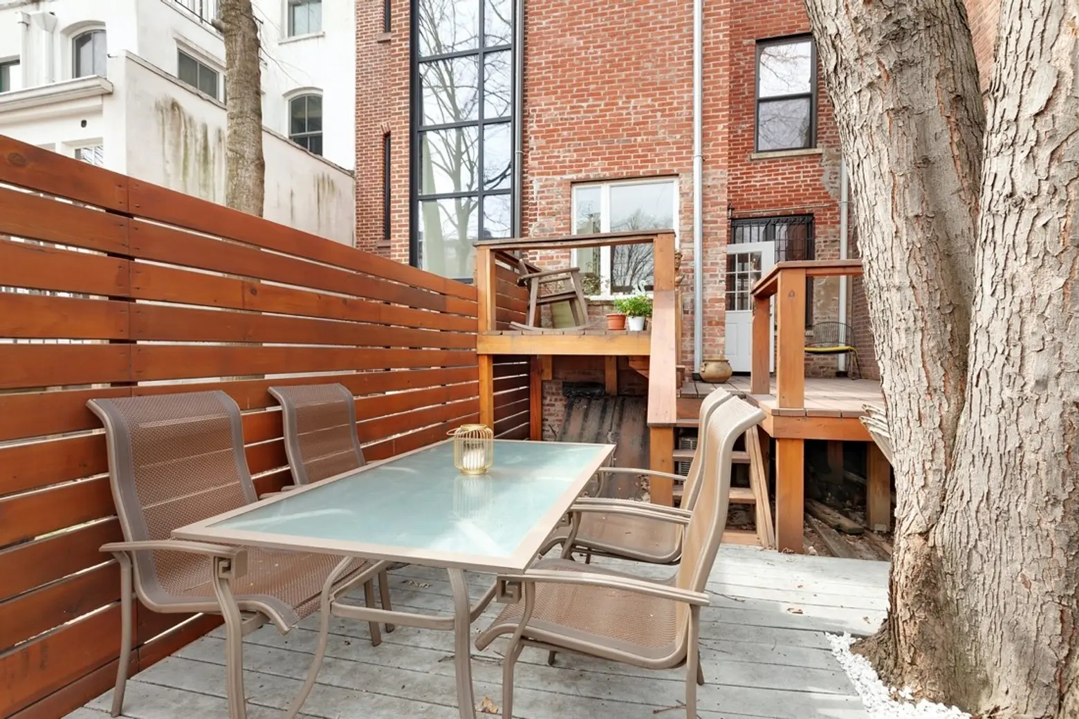 For $7,000/month, rent this modern Clinton Hill townhouse with a treehouse-like backyard