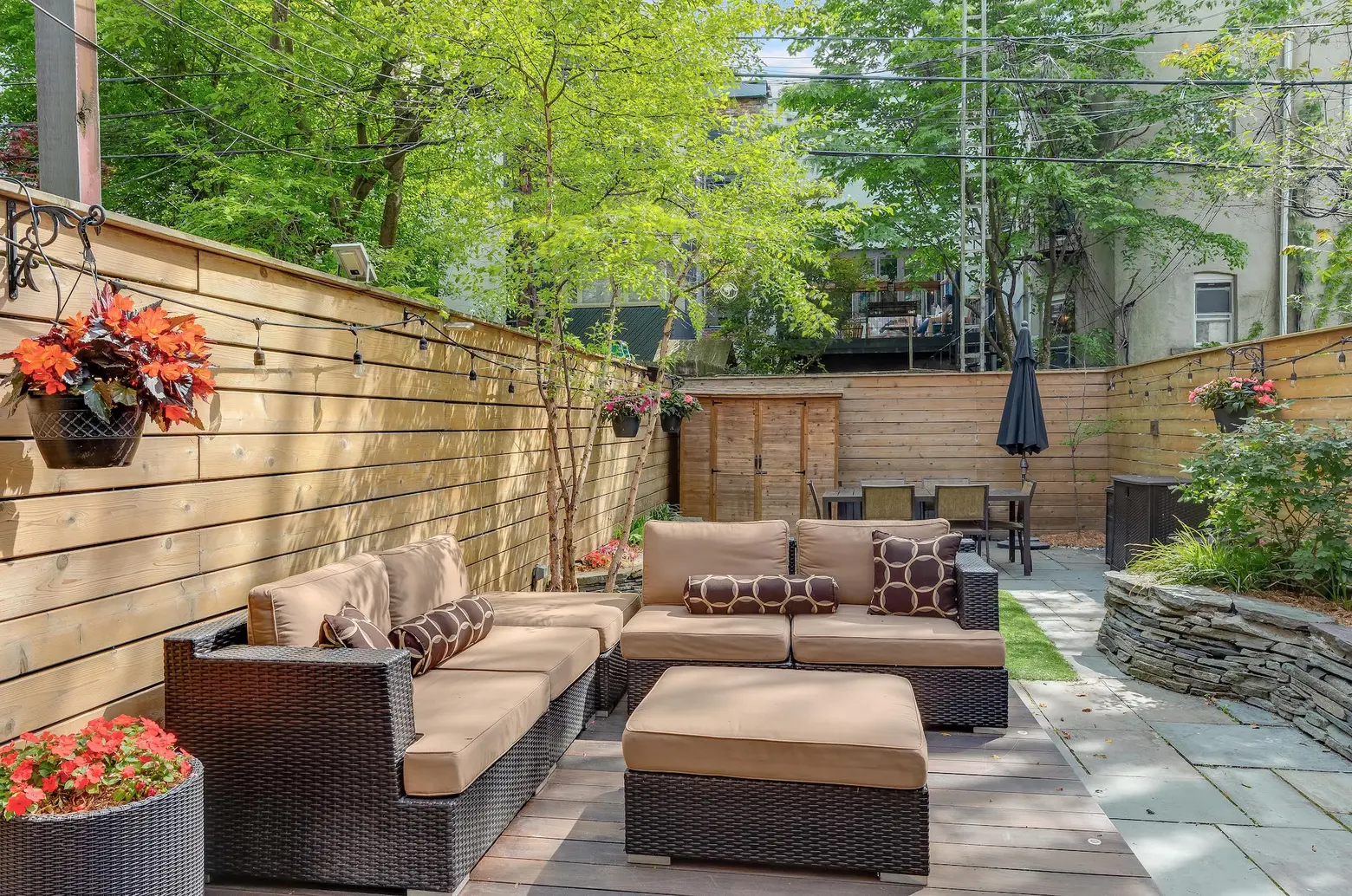 $2.3M Park Slope rowhouse has tranquil interiors and a party-ready backyard