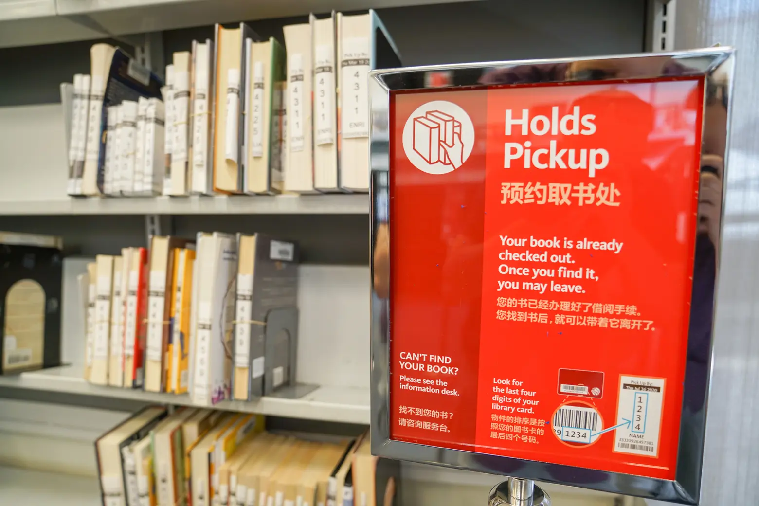 NYC public libraries reopen 22 branches for grab-and-go service