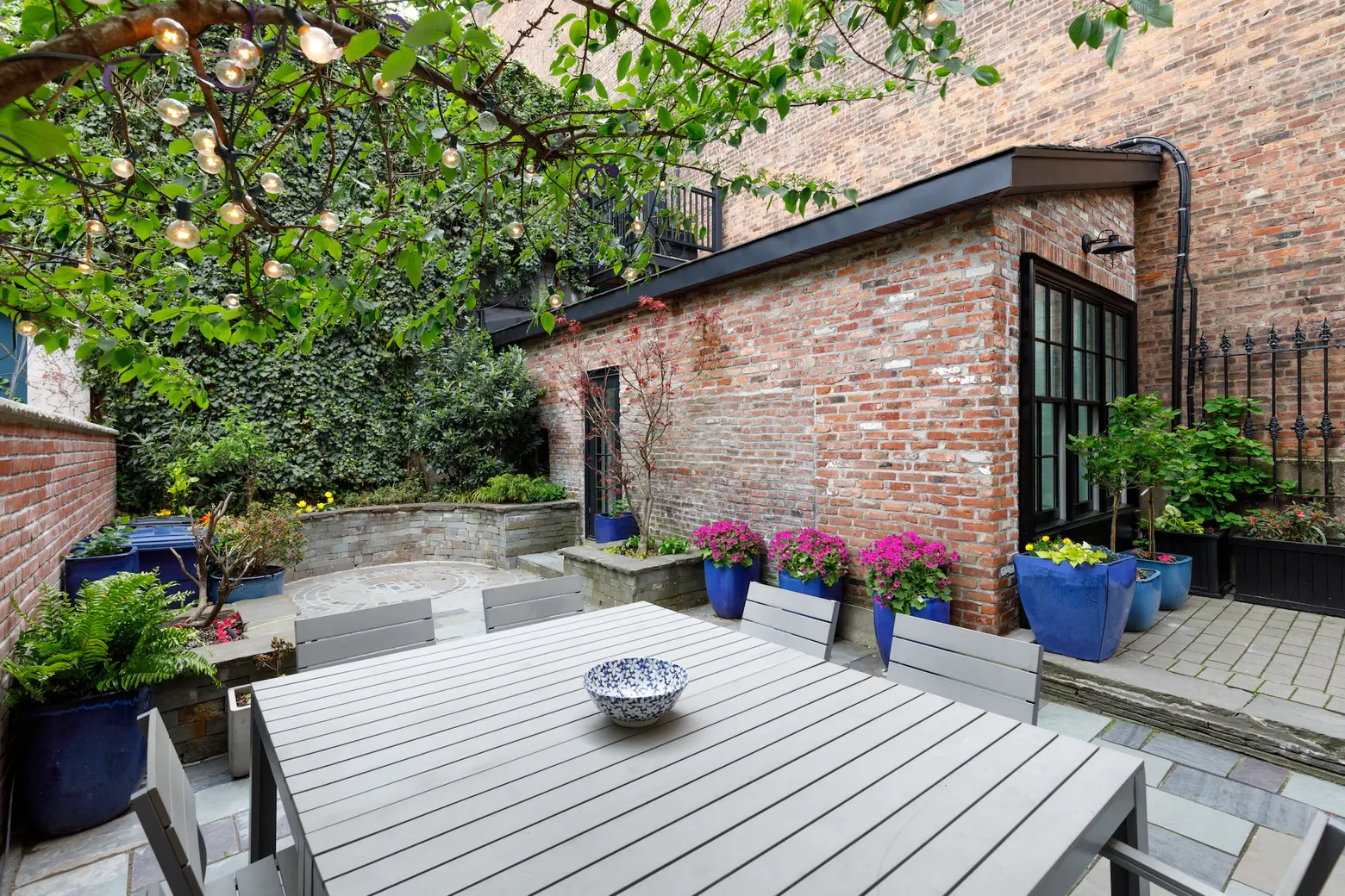 This $3.5M Park Slope townhouse comes with private parking and an enchanted garden