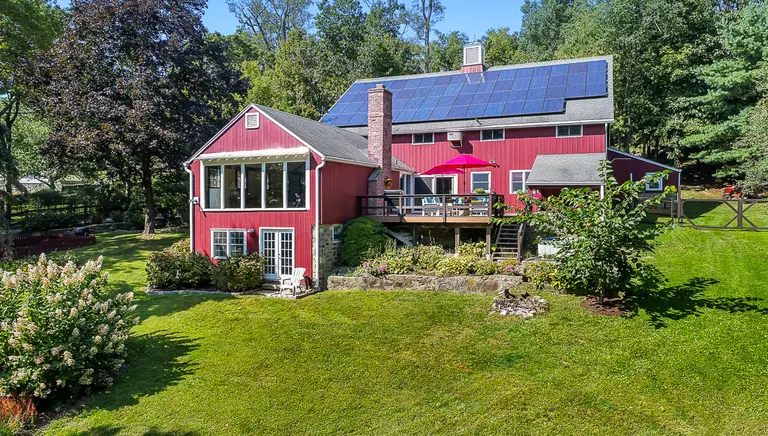 Just 30 minutes from NYC, a renovated Westchester barn with gardens, orchards, and a pool asks $1.35M