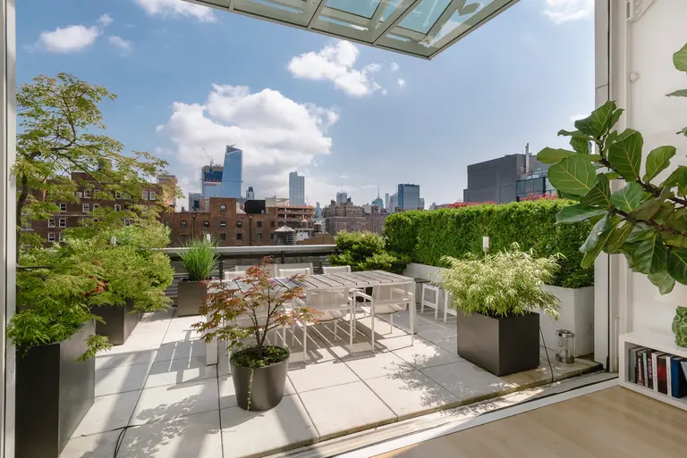$8.9M Chelsea penthouse has a movable glass wall, four terraces, and a roof deck