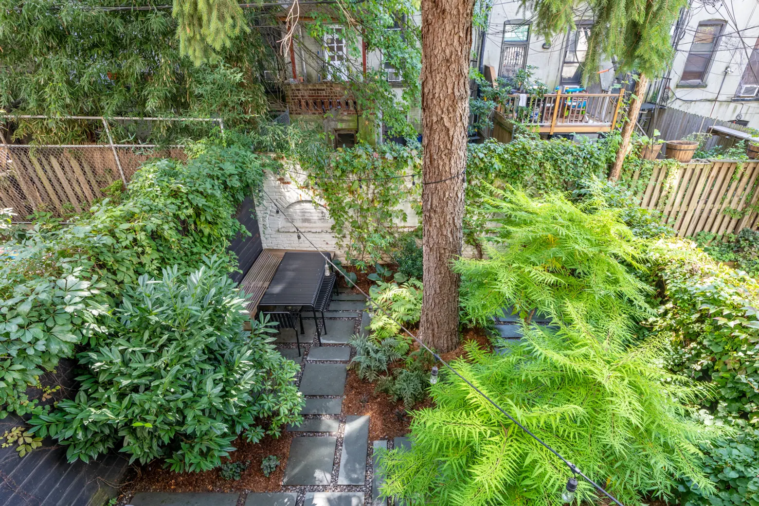 The backyard at this $2.6M Park Slope condo has designer cachet