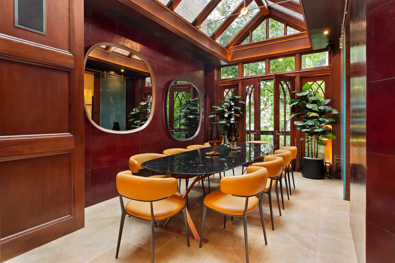 $22M Upper East Side townhouse has a teak media room, mid-century solarium, and neon accents