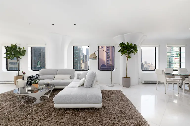 Tulip columns and marble floors complete the mid-century look at this $2M Midtown East co-op