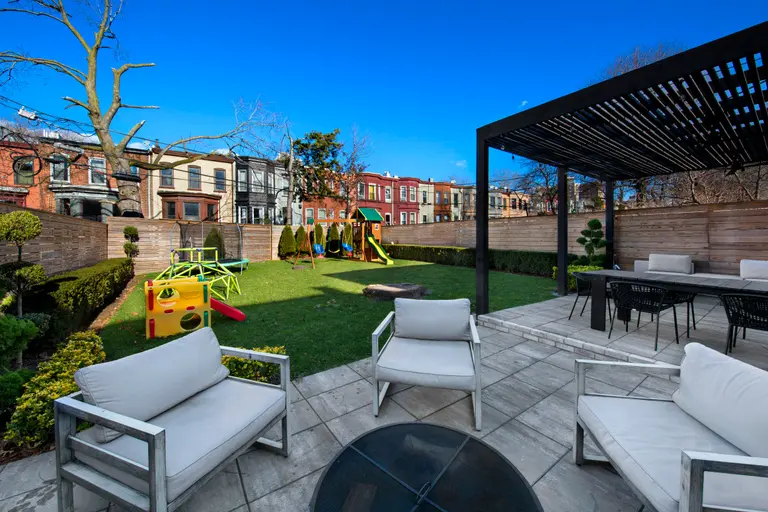 The huge backyard at this $2.65M Crown Heights townhouse is a family oasis