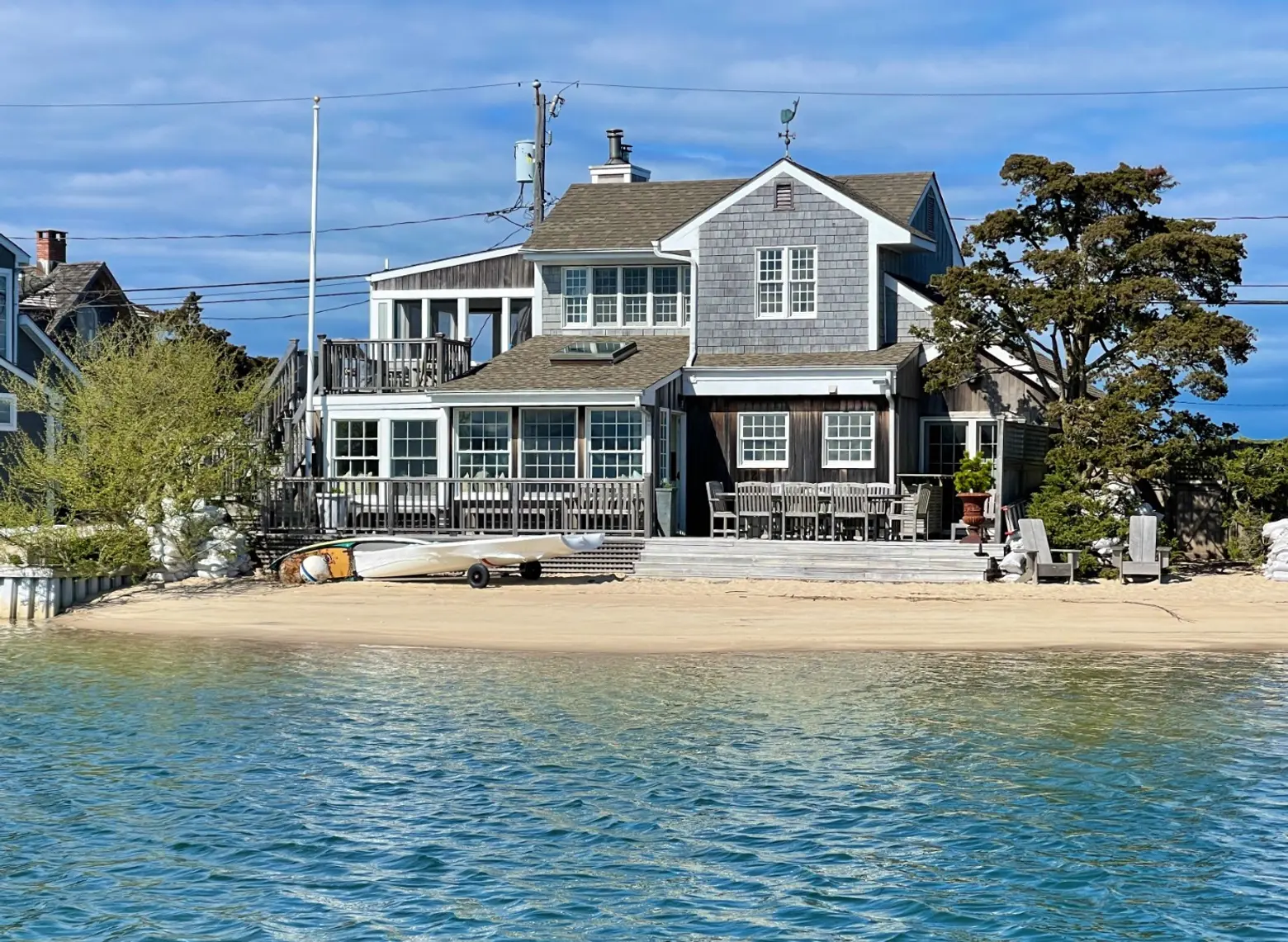 For $2.4M, this harborside Southampton cottage comes with a private beach