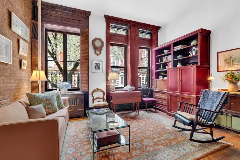 $465K Upper West Side studio has stained-glass windows, wood shutters, and more
