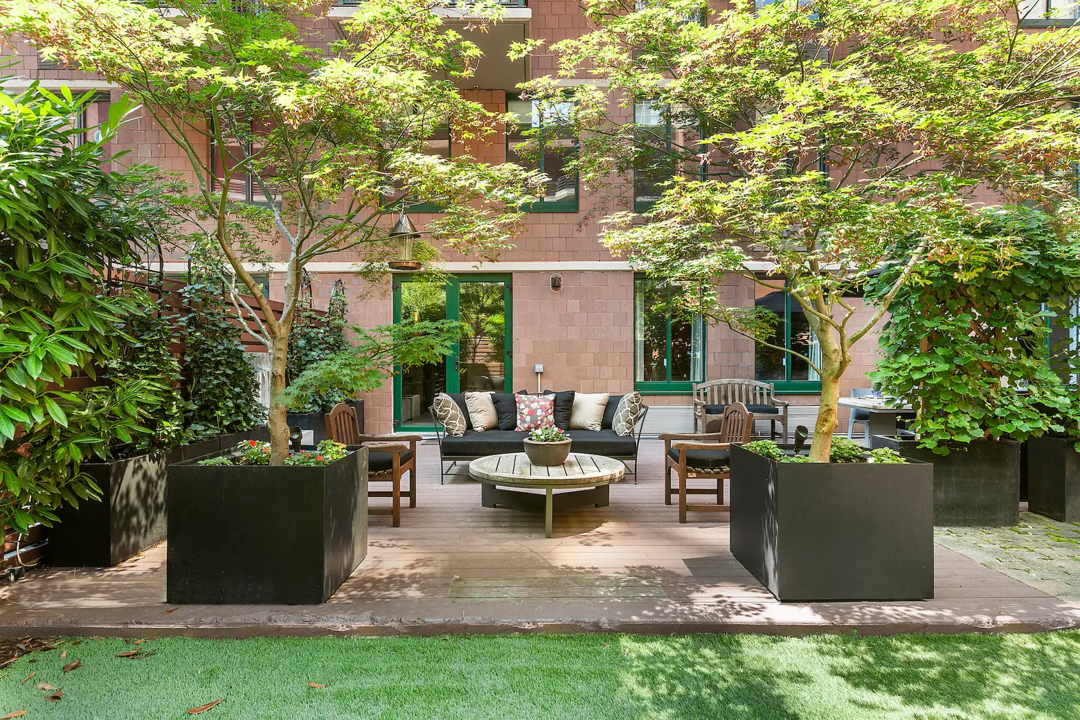 $4M Battery Park City condo is a slice of suburbia with a two-car driveway and private backyard