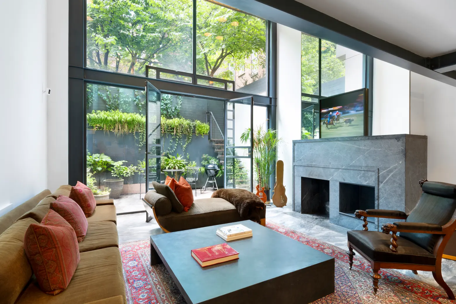 Historic West Village rowhouse has a modern garden and glass addition for $11M