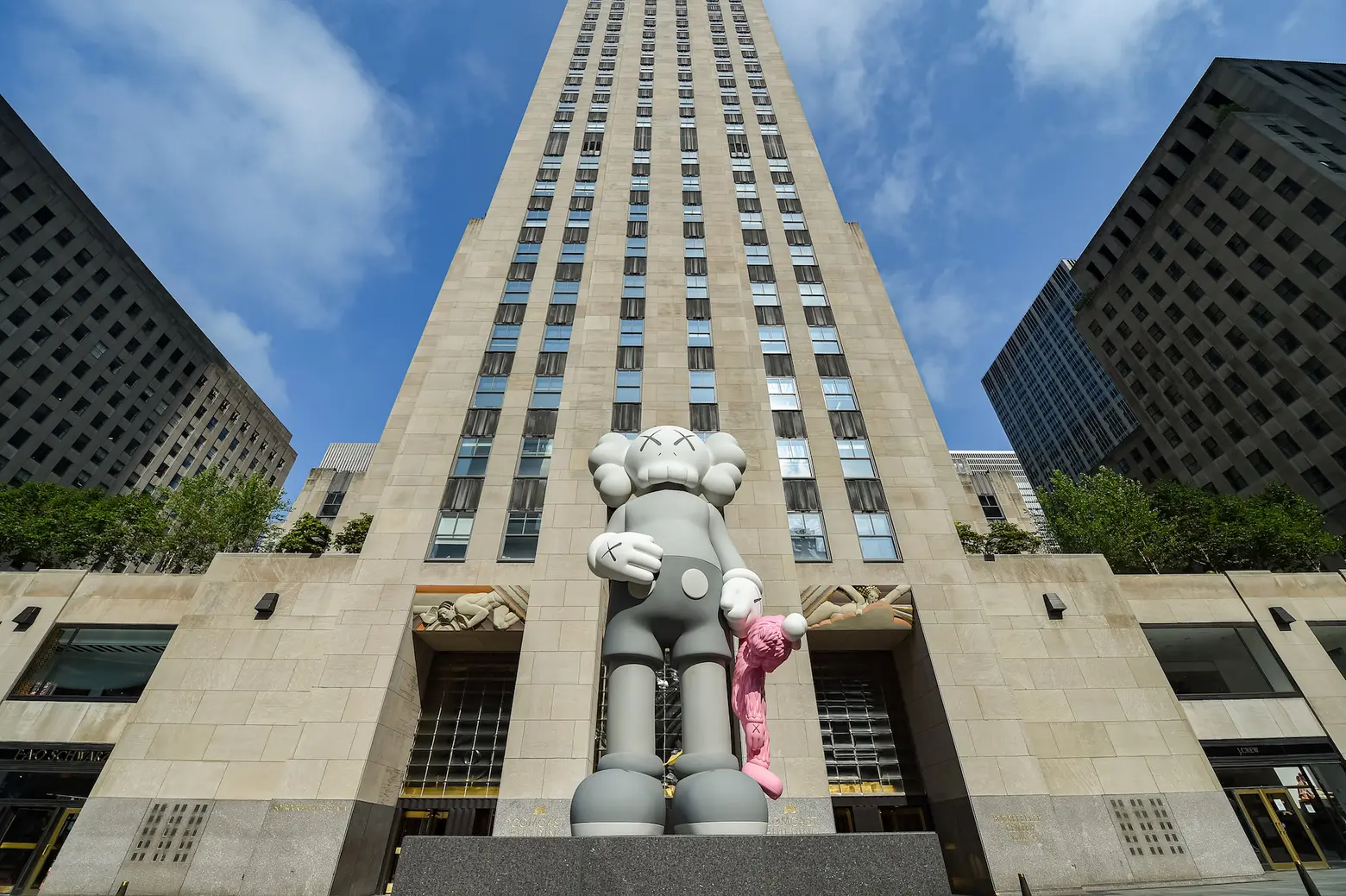 KAWS unveils new 18-foot sculpture at Rockefeller Center