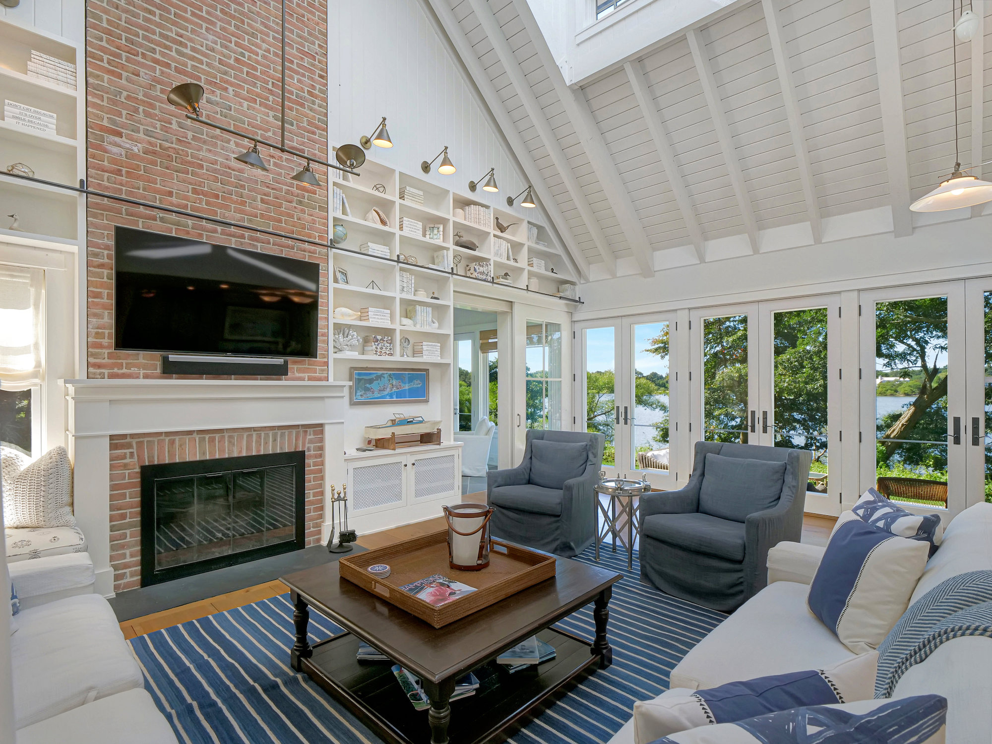 $1.8M Hamptons home is relaxation-ready with crisp interiors and a serene  backyard