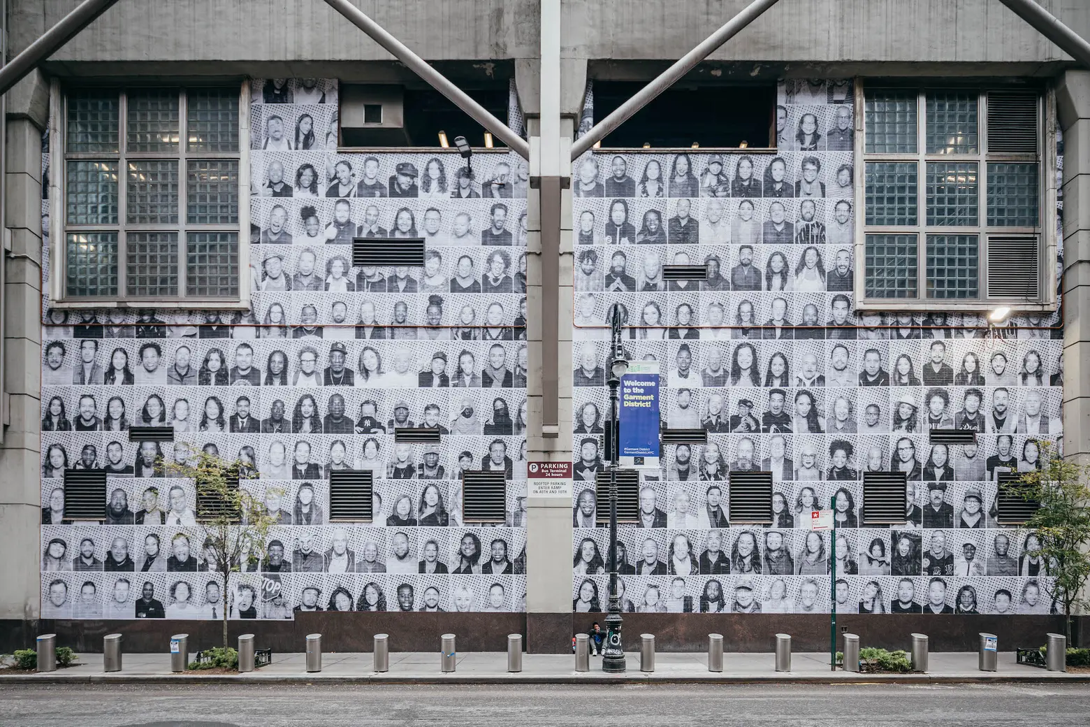 The faces of 1,200 New Yorkers now greet visitors outside of the Port Authority bus terminal