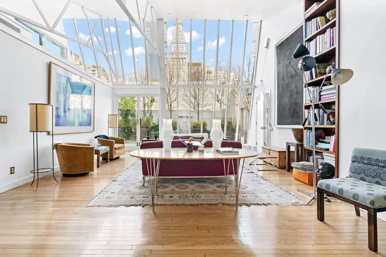 Behind a double-height glass wall this $5M Flatiron co-op has architectural flair and a private terrace