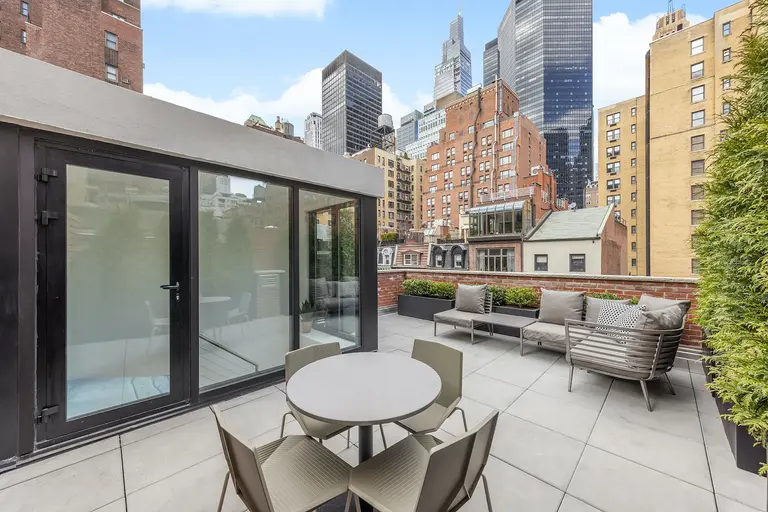 This furnished $5.75M Midtown townhouse has been designed for modern living, framed by a rich history