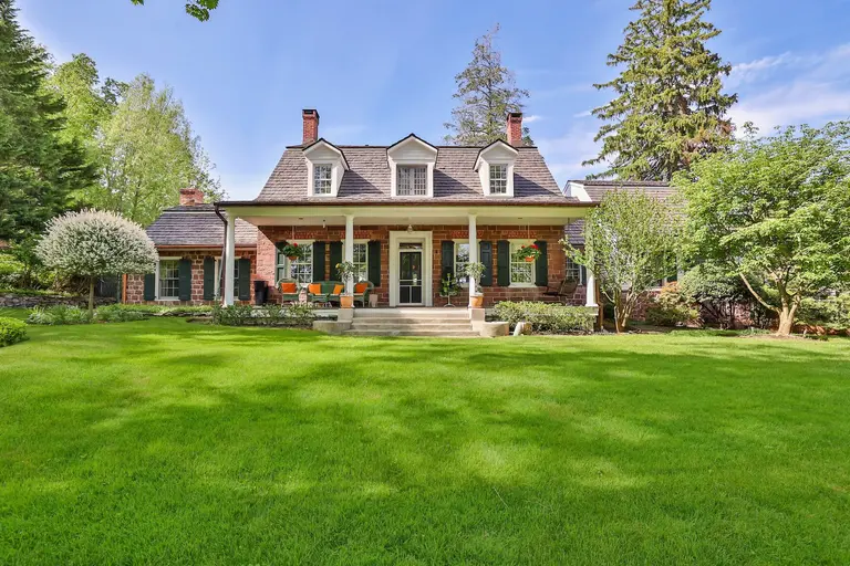 $1.6M upstate Dutch Colonial home is summer-ready with a saltwater pool, pergola, and outdoor kitchen