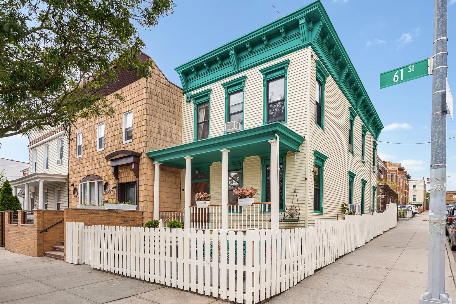 For $1.4M, this 1890s Ridgewood house has vintage charm, a front porch, and three garages