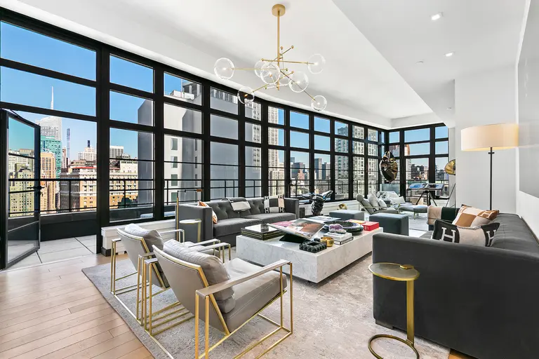 Look out over Manhattan from your glass-wrapped living room in this $7M Chelsea penthouse