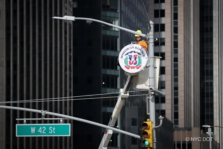NYC unveils first restored national medallions along Manhattan’s Avenue of the Americas