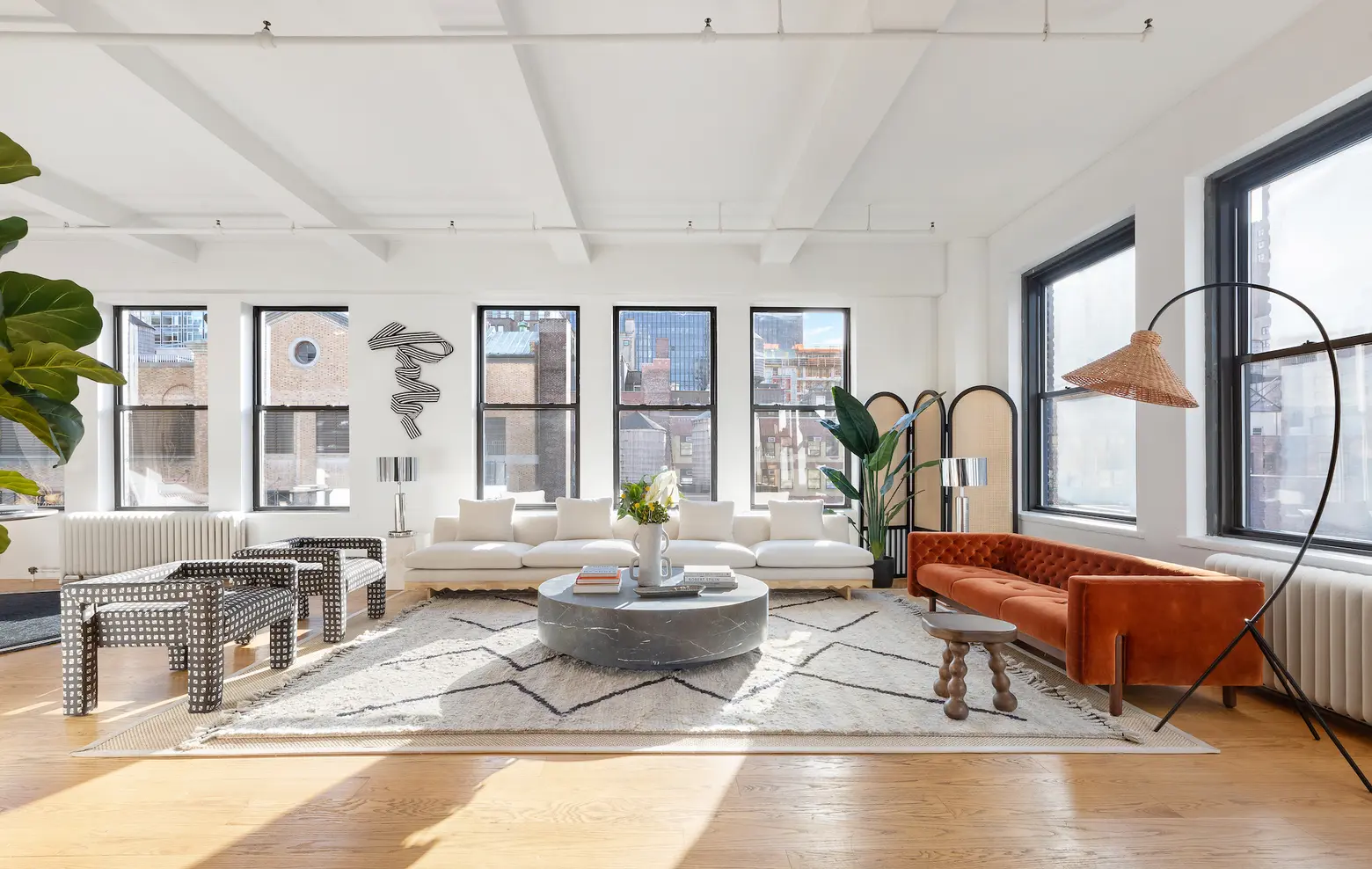 For $3M, this light-filled Midtown duplex loft is surrounded by Manhattan skyline views