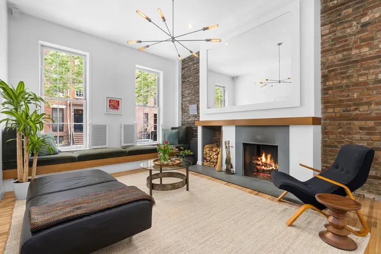 $3.2M Chelsea brownstone duplex has a magical private garden and a fireplace in every room