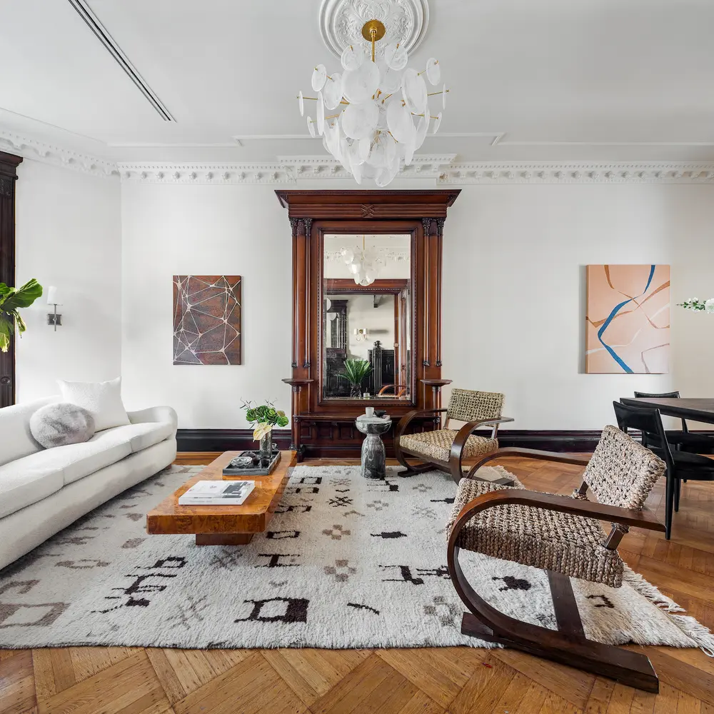 This $3.6M Bed-Stuy townhouse has bay windows, a full-floor bedroom suite, and a basement speakeasy