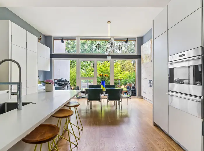 For $2.8M, this two-family Red Hook home with endless outdoor space is a modern townhouse dream