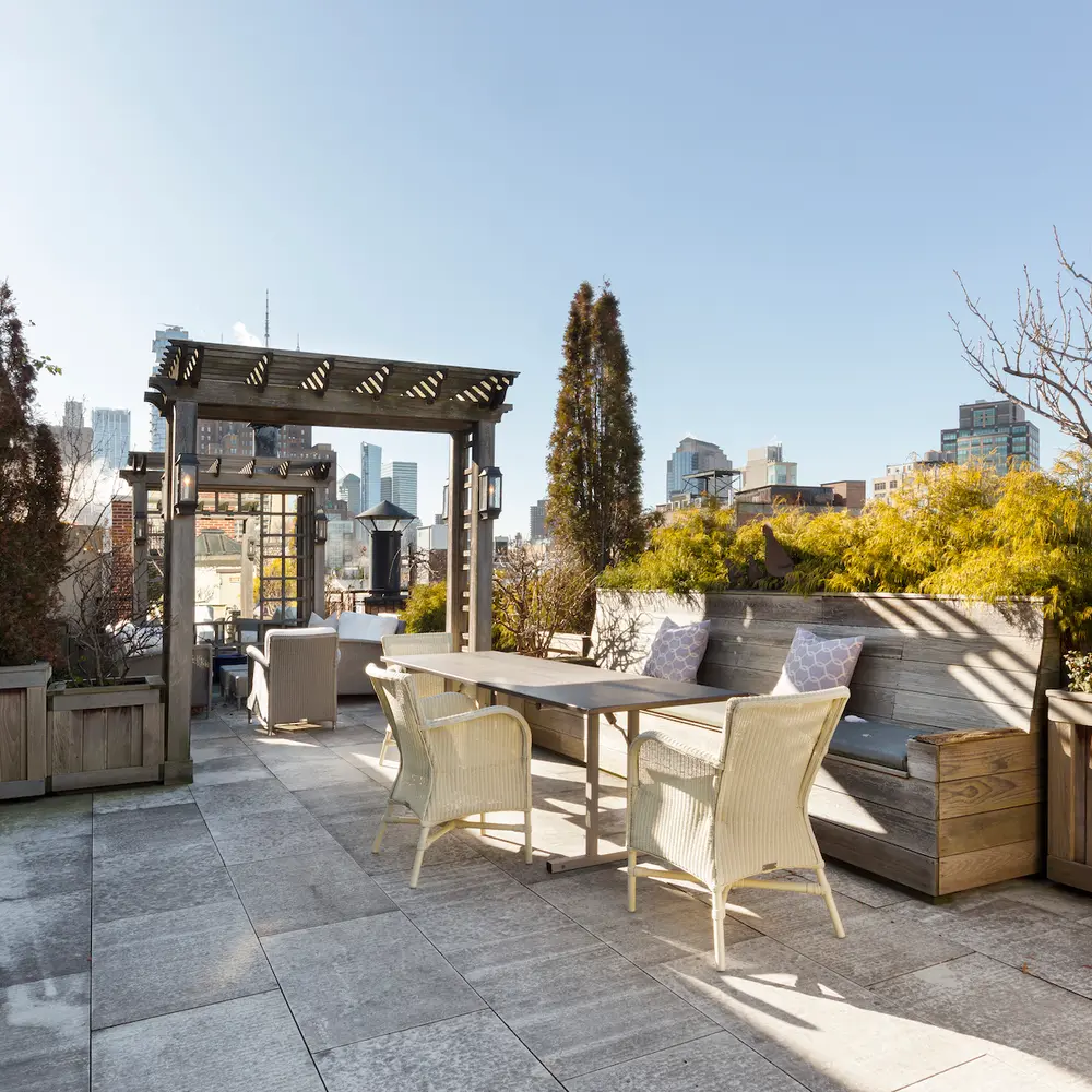$7.9M Soho penthouse feels like a country estate with a magical rooftop garden, hot tub included
