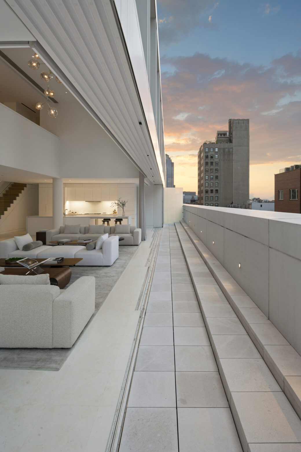 Designed by Shigeru Ban this 12M Tribeca penthouse glows atop a