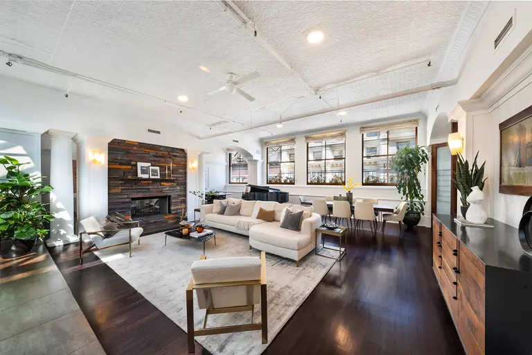 Dine and dance on the private rooftop of this $6.4M Flatiron penthouse loft