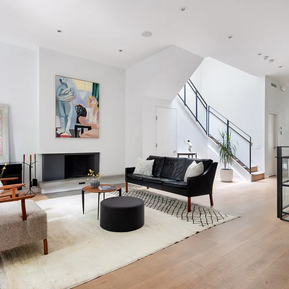 This $17M West Village townhouse is a glass-walled modern home behind a restored historic facade