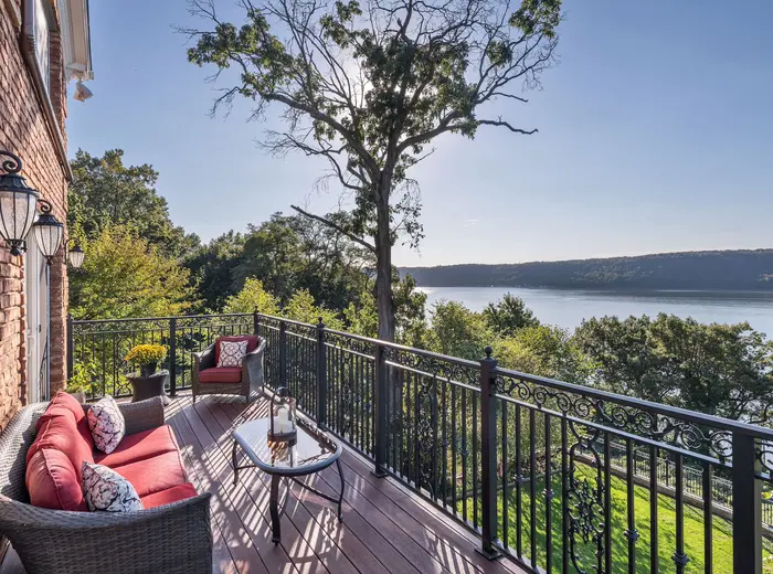 Fire up your outdoor kitchen while looking out on the Hudson River in this $6M Bronx home