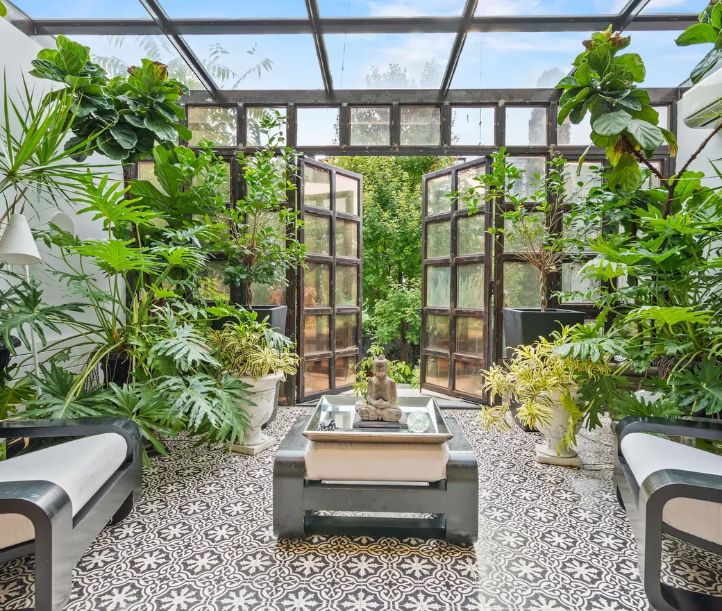 Escape to a tropical paradise in the solarium of this $3.3M Park Slope townhouse