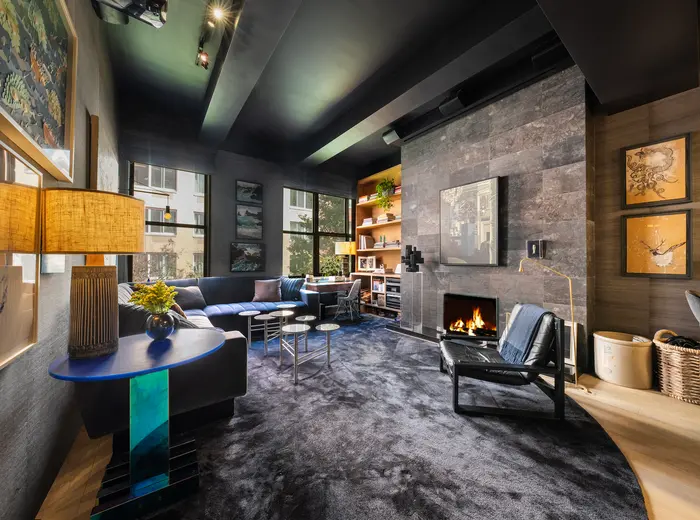 A designer's sophisticated Hell's Kitchen loft in a former bakery asks $1.27M