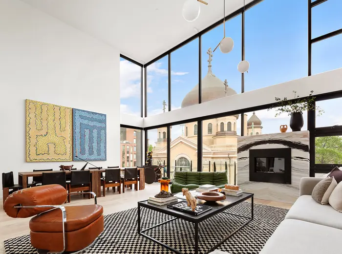 For $4.75M, this Williamsburg condo wraps 21st-century living in glass, with a priceless view