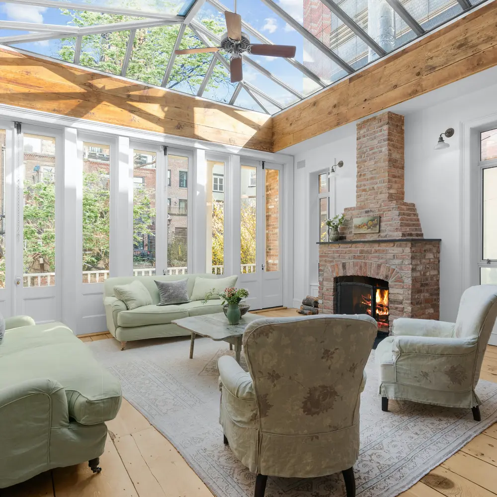 Step from the glass-clad conservatory onto a magical tea porch in this $7.25M Brooklyn Heights townhouse
