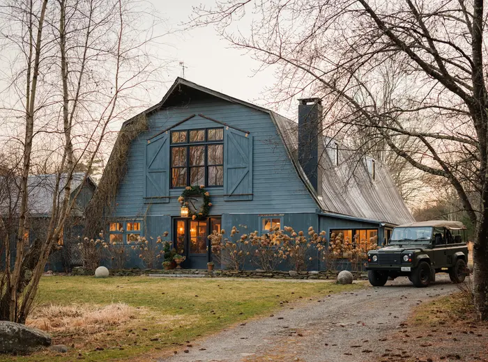 A fashion designer's cozy converted 1920s barn in upstate NY asks $2.9M