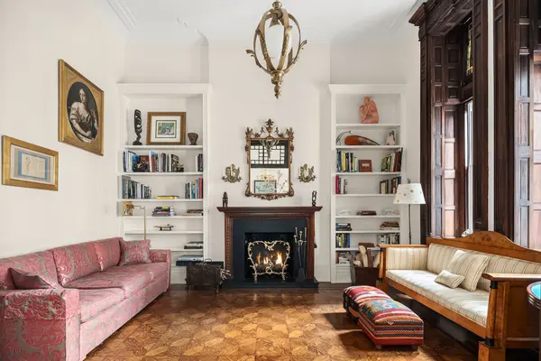This $5M co-op at The Osborne has old-world glamour, Tiffany glass, and a bonus studio