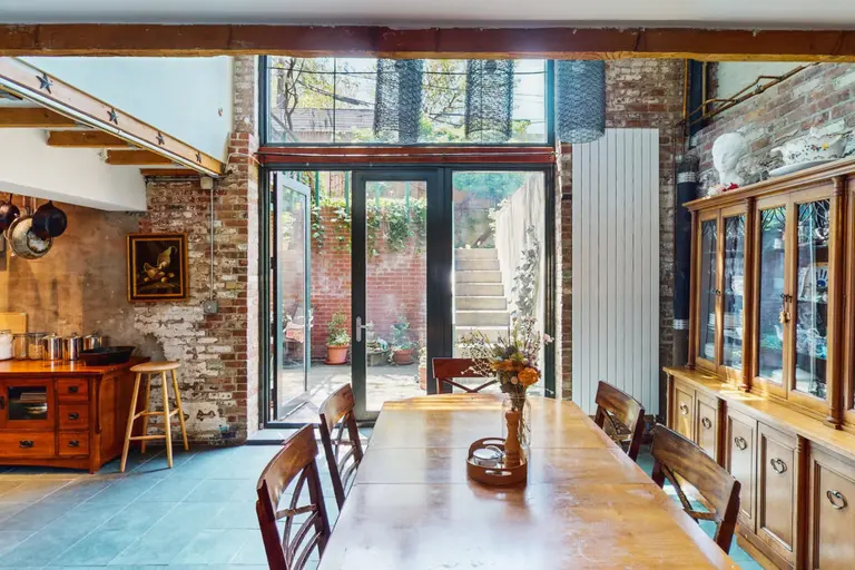 Asking $2.5M, this unusual Brooklyn condo feels like an artist’s loft inside a rustic farmhouse