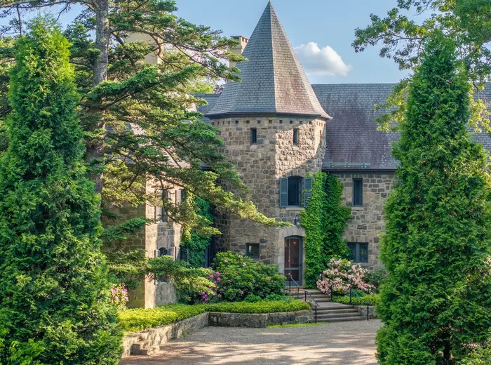 Live a life of country grandeur at this $12.25M French-inspired stone chateau in Garrison, N.Y.
