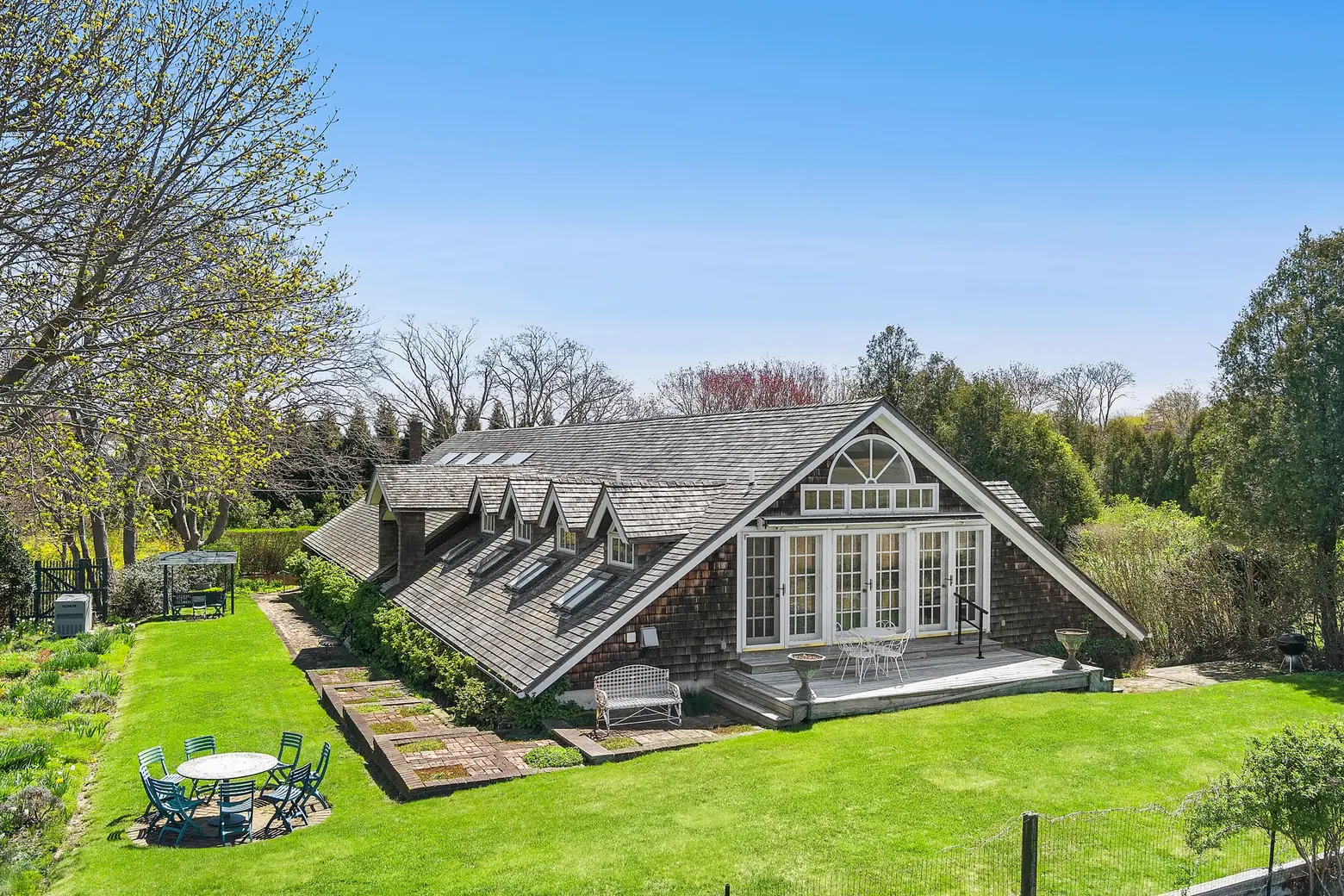 Asking $4.5M, this eclectic Bridgehampton home and artists’ studio was once a potato barn