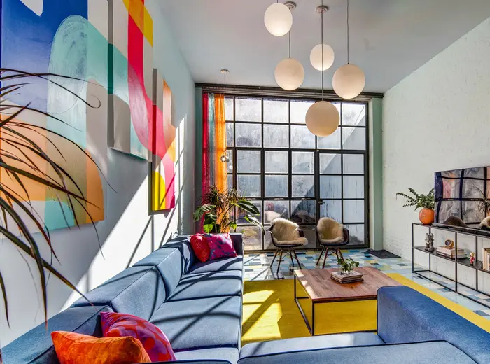Architect-designed Bushwick carriage house with a yard and private garage asks $2.4M