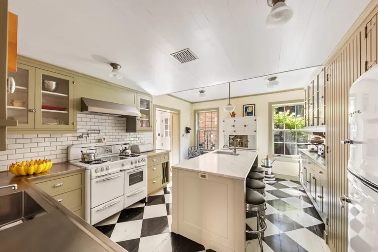 This $7.75M West Village home updates 1828 Federal style with a perfect country kitchen