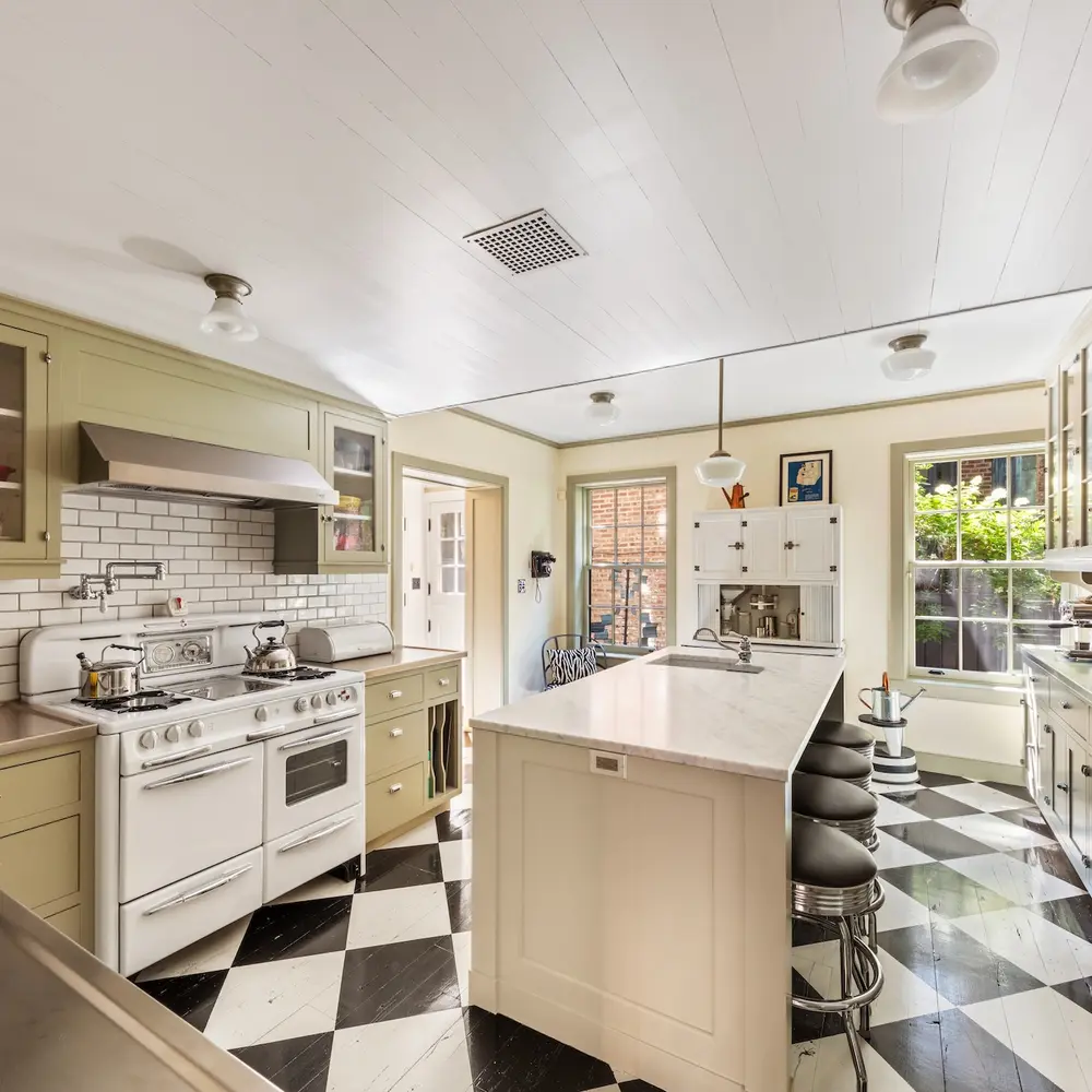 This $7.75M West Village home updates 1828 Federal style with a perfect country kitchen