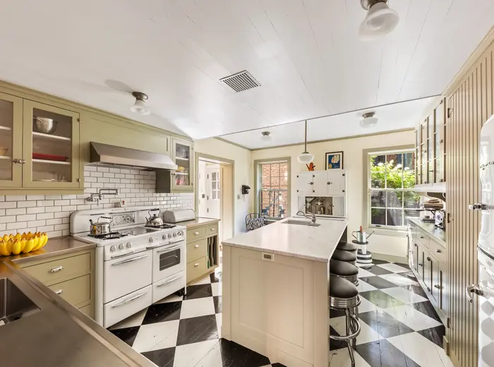 This $7.75M West Village home updates 1828 Federal style with a perfect country kitchen