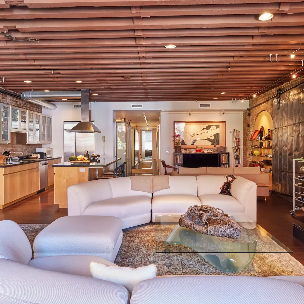 This $5.6M Tribeca condo in a former spice-grinding factory brings warmth to loft proportions